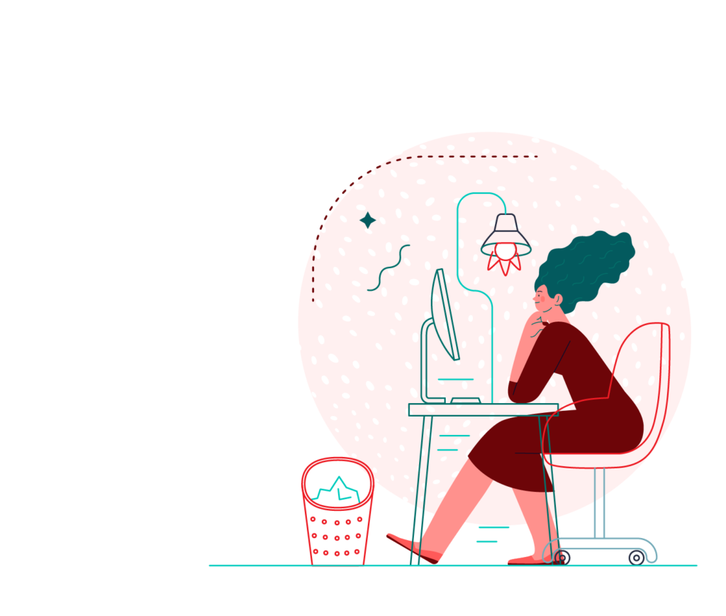 a girl sitting at her desk while working